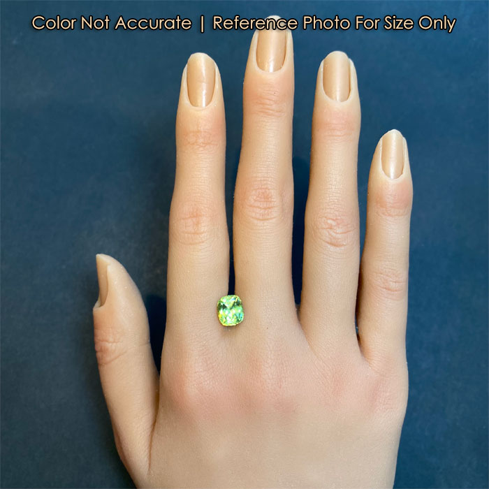 antique cushion green sphene size to hand