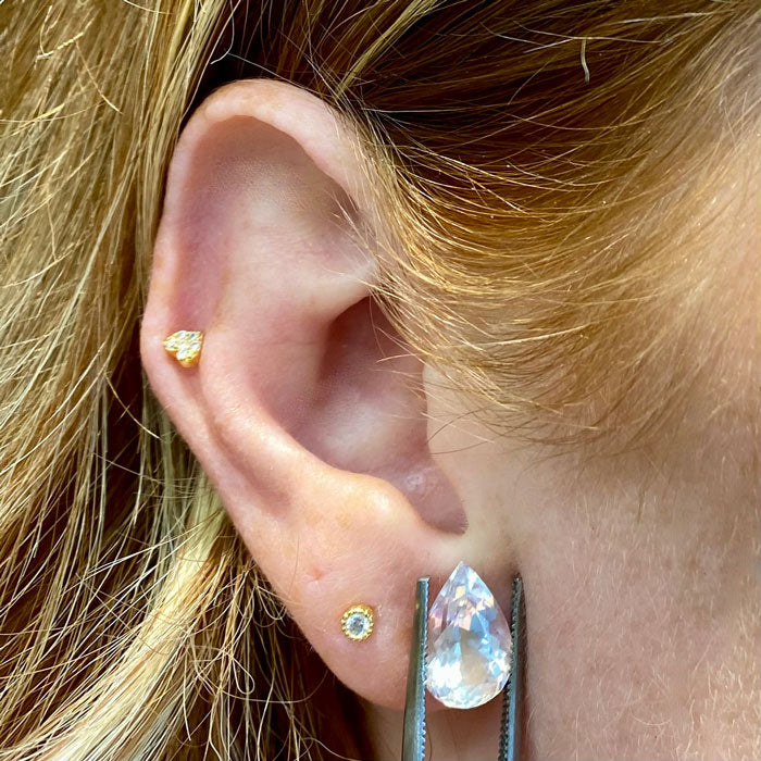 gemstone moonstone on ear 