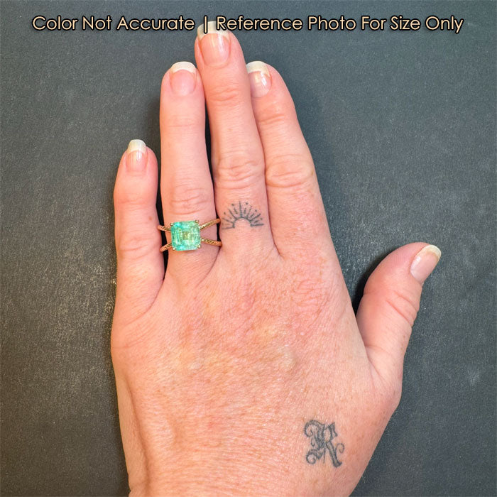 size of emerald and gold ring