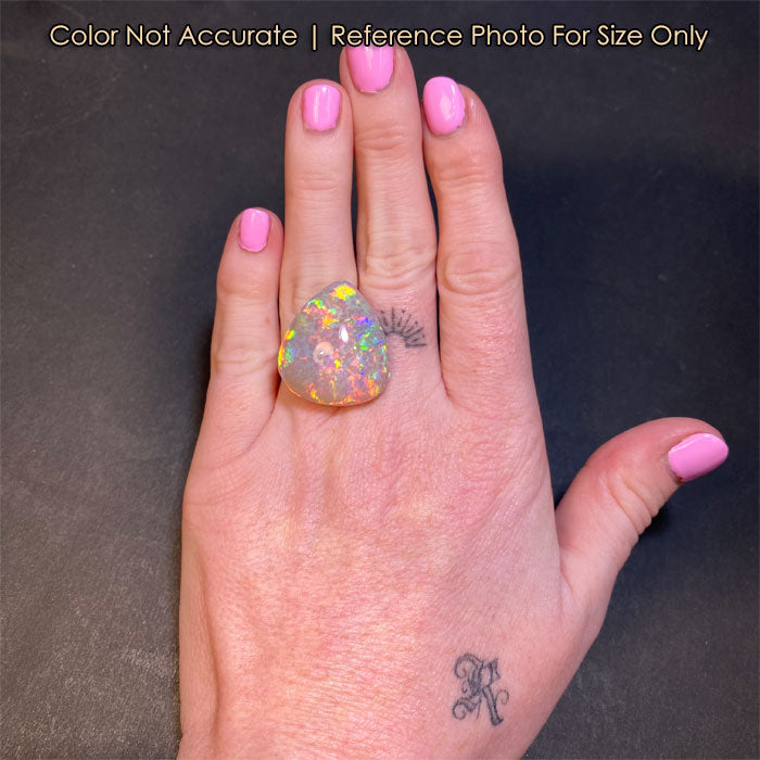 rainbow pear opal on hand