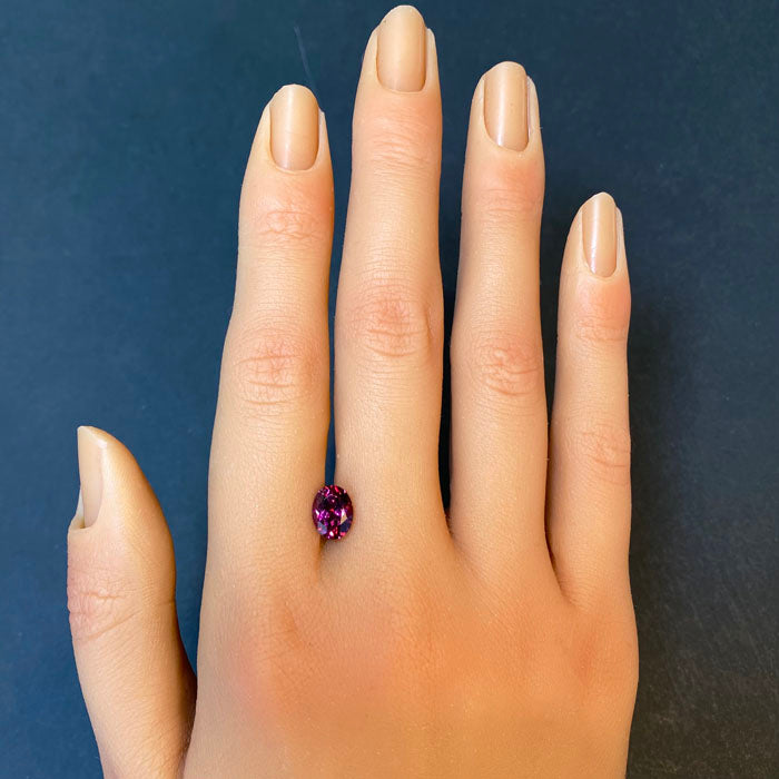 purplish red garnet oval cut