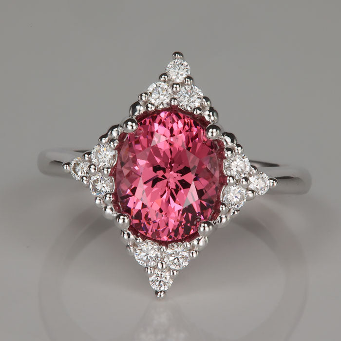 white gold diamond and pink garnet ring
