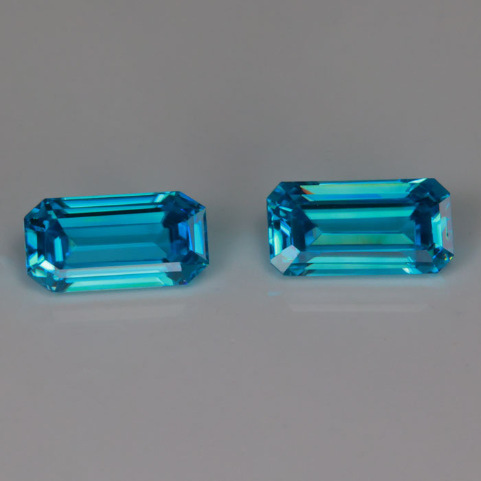 blue zircon gemstone pair emerald cut