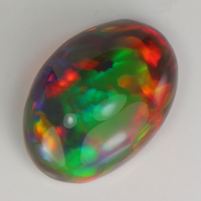 black opal gemstone rainbow colors oval cut