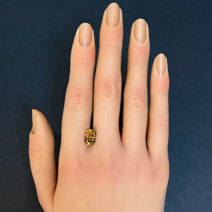 emerald cut golden zircon gem