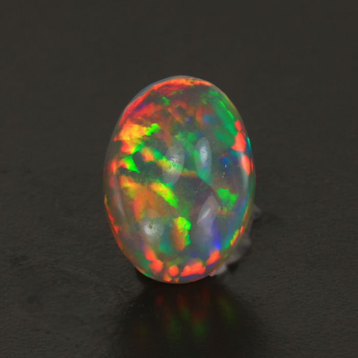oval cut opal gemstone semi black