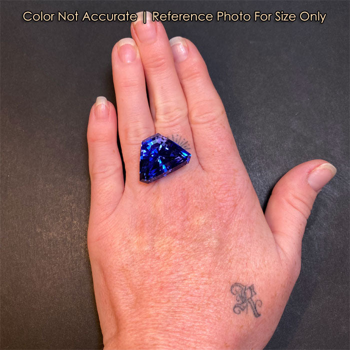 size of stepped shield tanzanite to hand