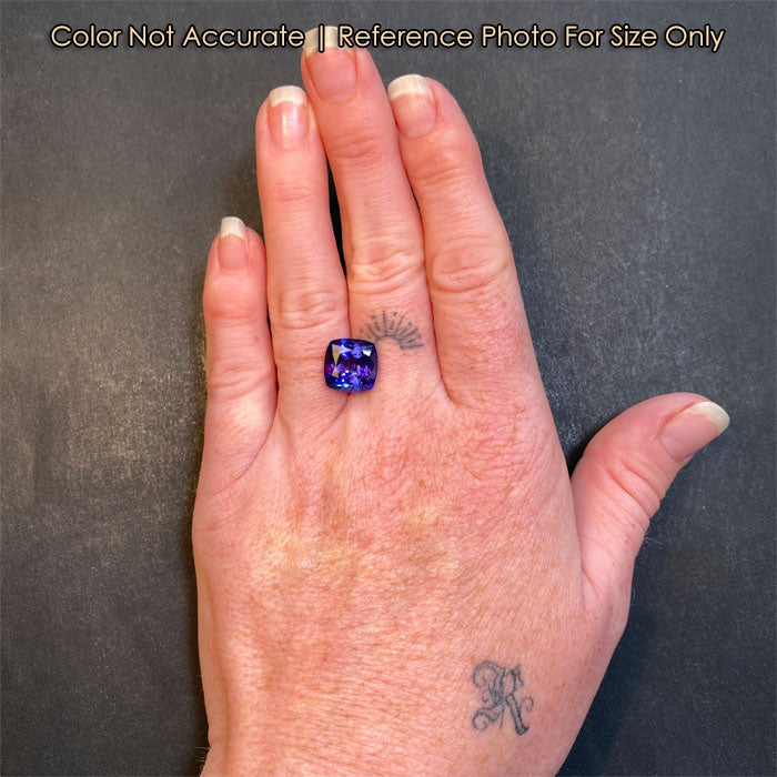 size comparison of tanzanite on hand