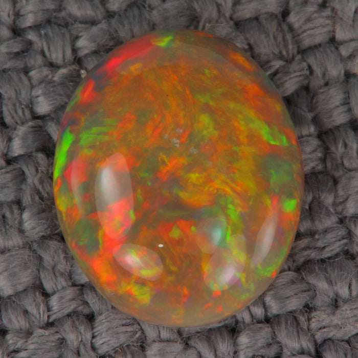 oval cabochon cut opal gemstone from Ethiopia