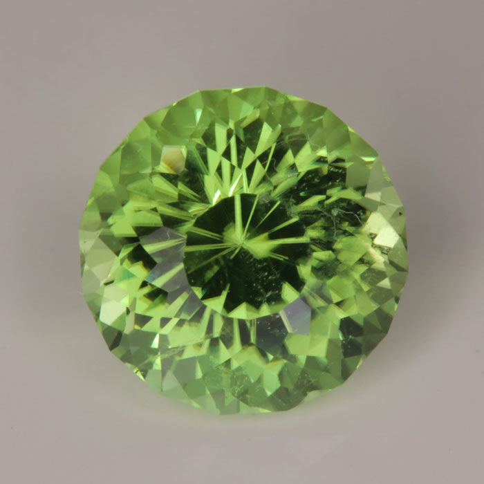slightly blue green peridot gemstone from the himalaya mountains 