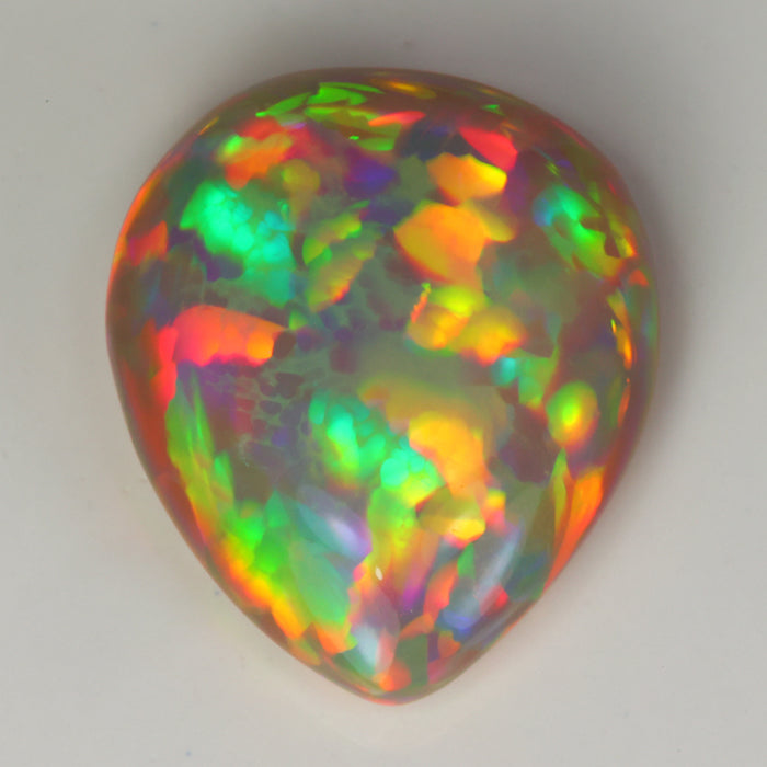 rainbow color pear shape semi black opal gemstone