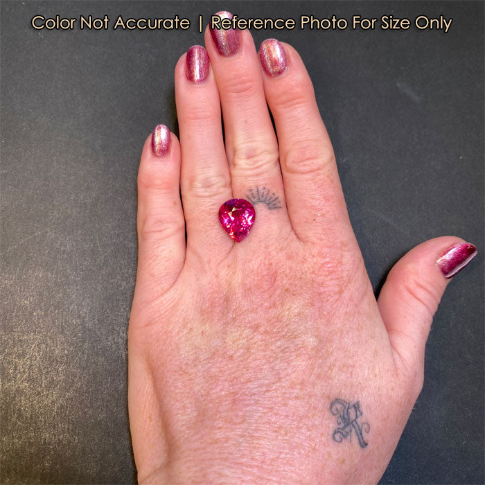 hot pink tourmaline on hand 