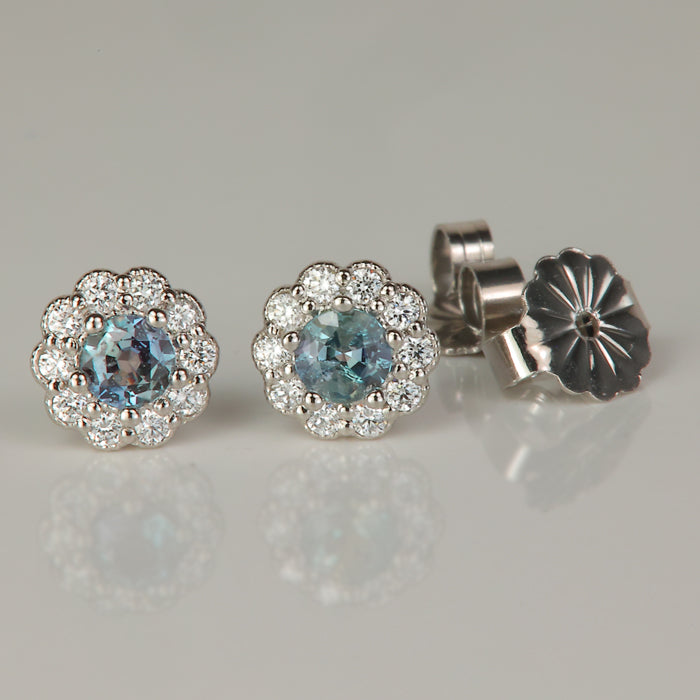 white gold alexandrite and diamond halo earrings 