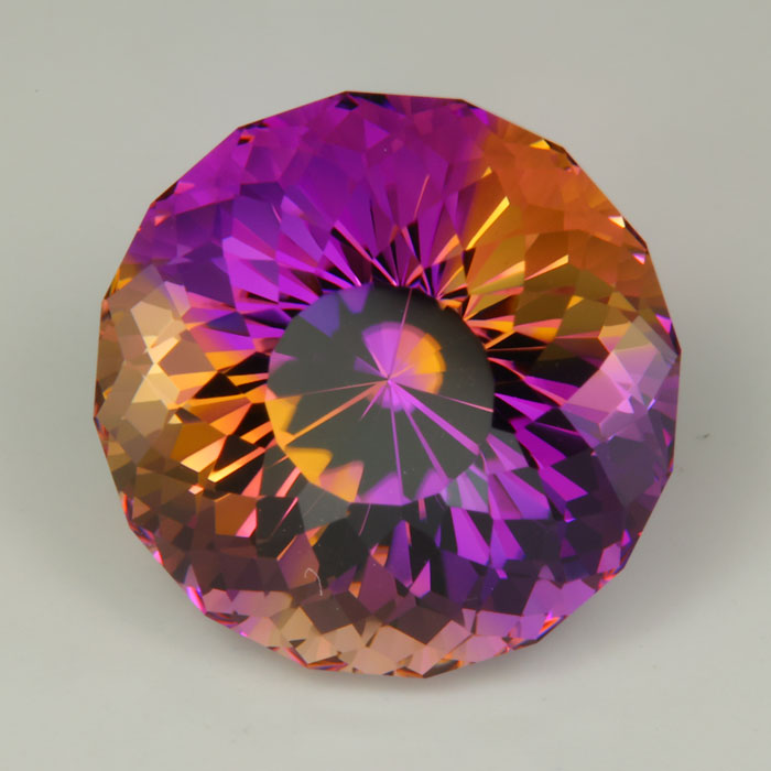 purple yellow round portuguese cut ametrine gemstone