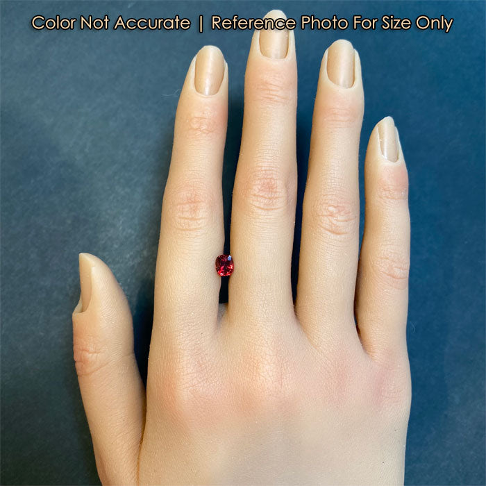 red color spinel gemstone size to a hand