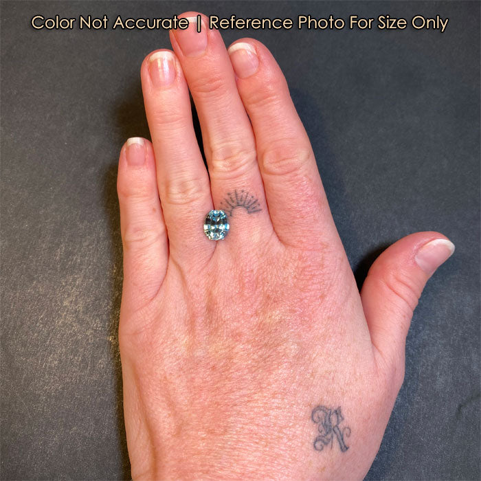 hand size reference of blue zircon