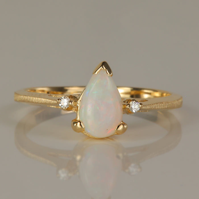 yellow gold australian opal ring with diamond accents