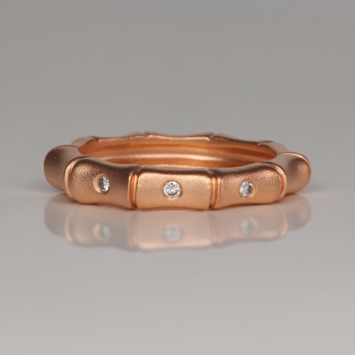 rose gold bamboo estate ring with diamond accents 