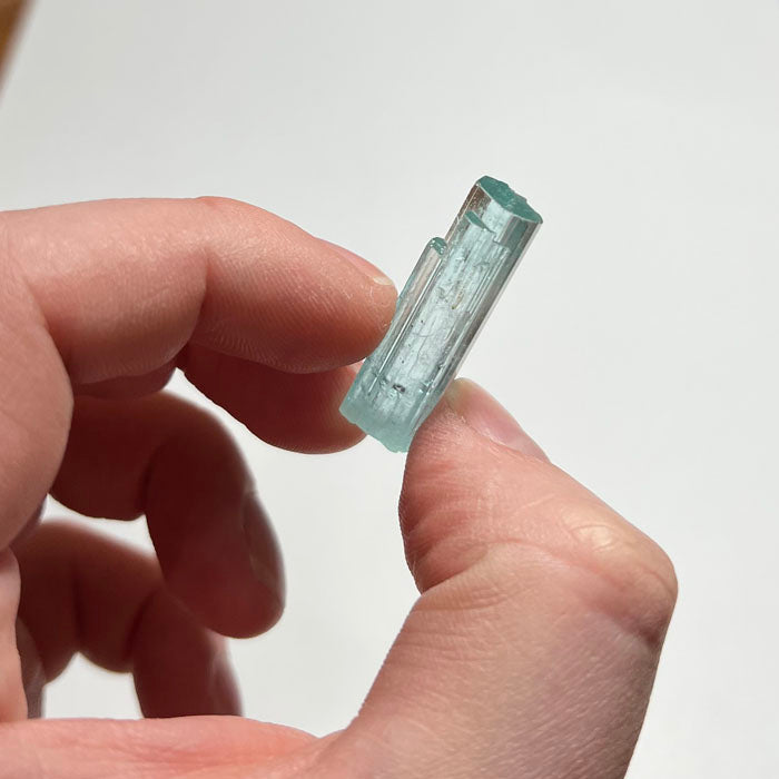 natural beryl crystal inn hand