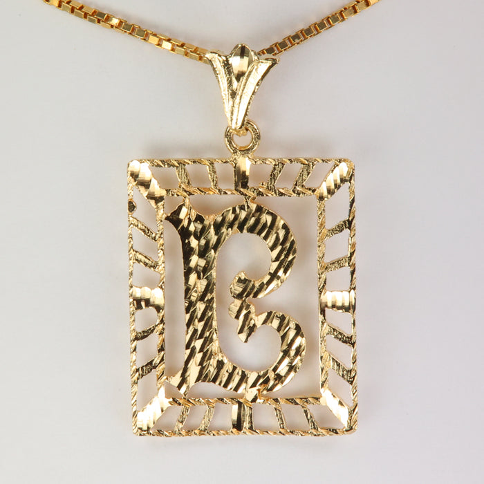 yellow gold pendant with B initial in script