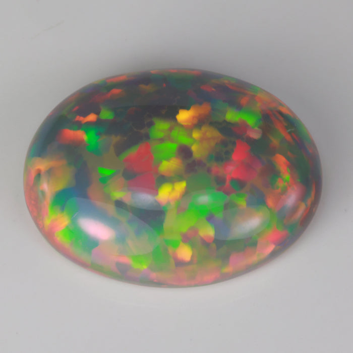 Oval cut black opal gem