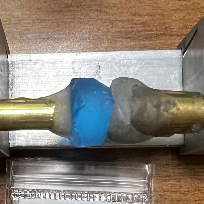 swiss blue topaz gemstone on dop 