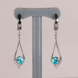 blue zircon earrings in white gold with diamonds
