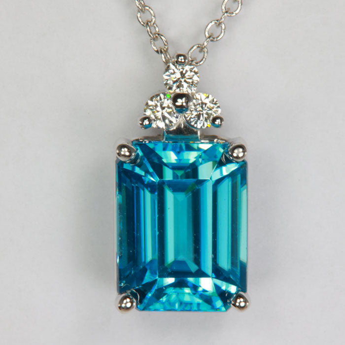 Blue Zircon Emerald Cut Necklace Pendant with Diamonds in White Gold