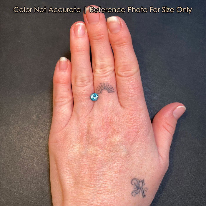greenish blue zircon gem size