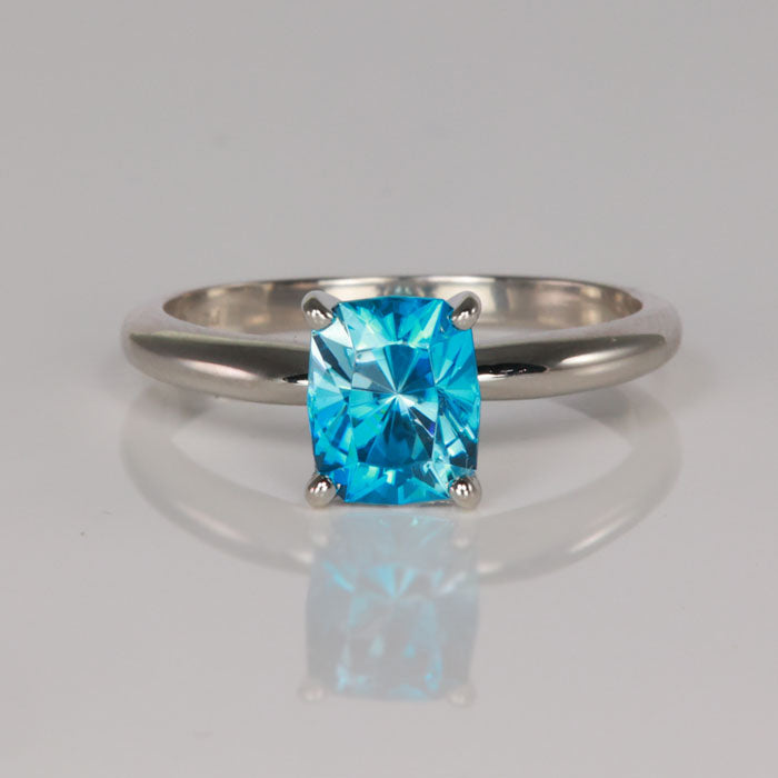platinum and blue zircon ring