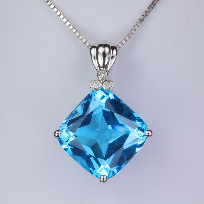 white gold square cushion blue topaz and diamond pendant