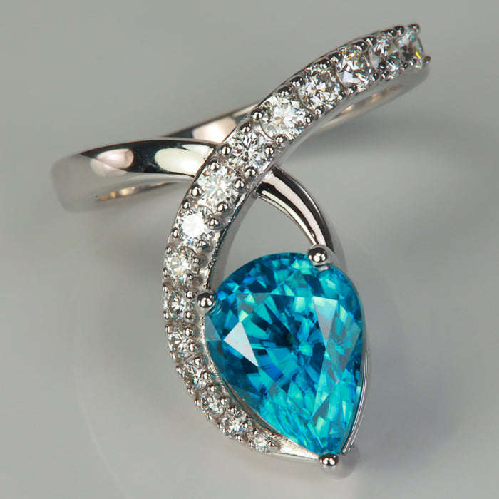 pear shape brilliant blue zircon ring in white gold with diamonds