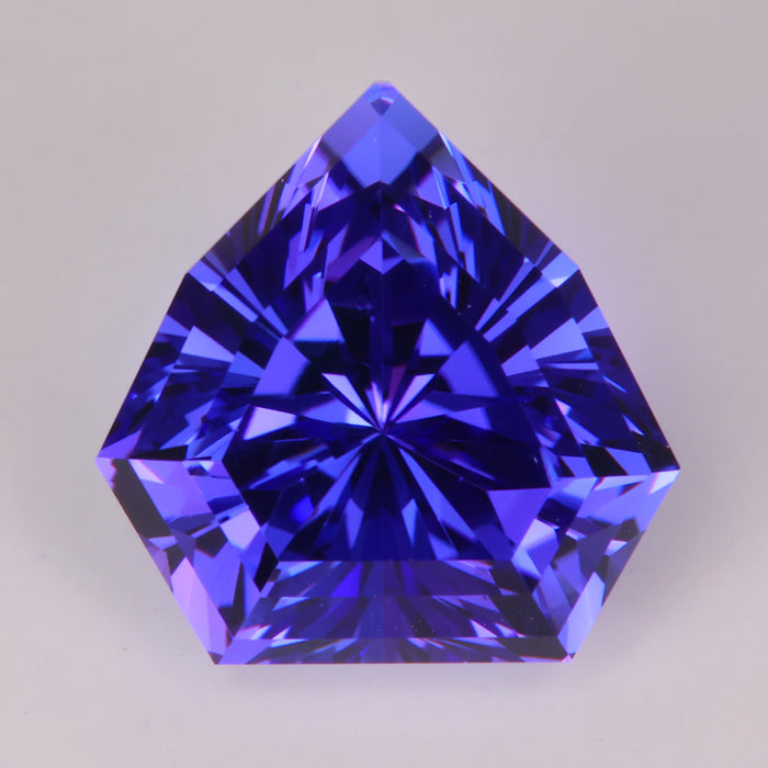 natural blue violet color tanzanite gemstone shield cut brilliant style