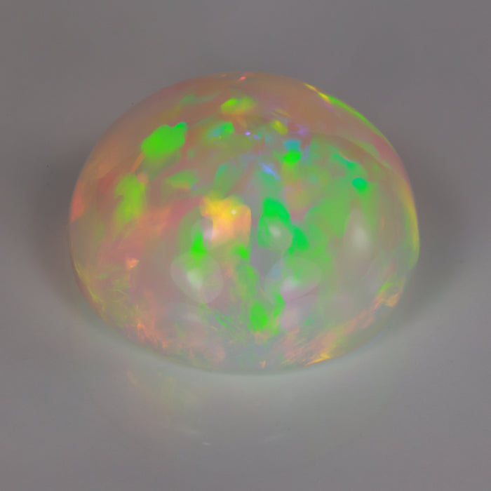 round ethiopian opal gem rainbow colors