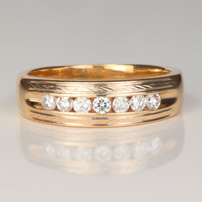channel set diamond ring in yellow gold