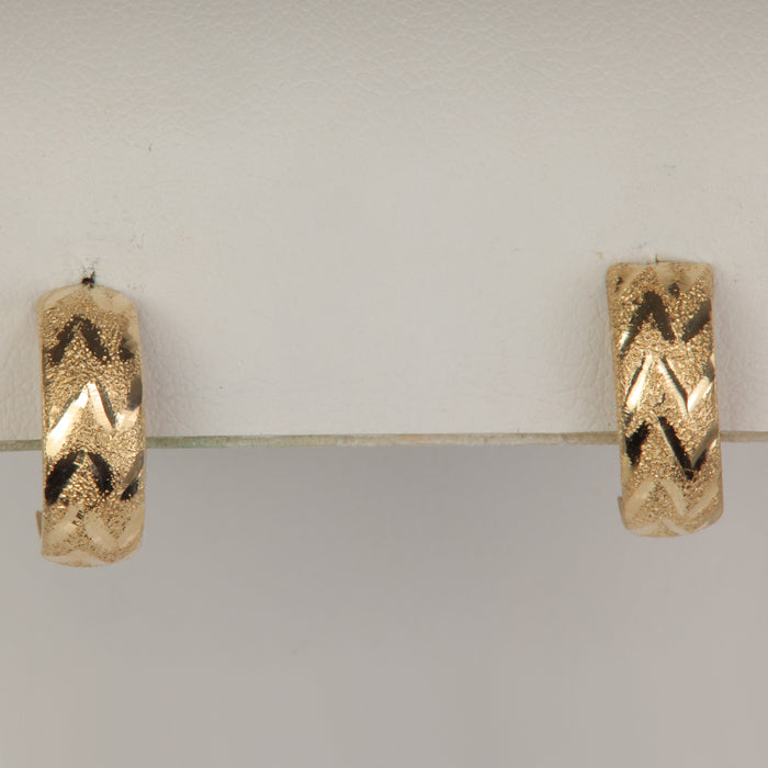 yellow gold chevron style diamond cut earrings