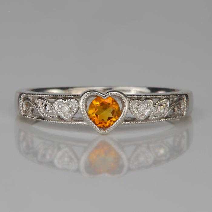 white gold ring with cittrine gemstone and diamond accents