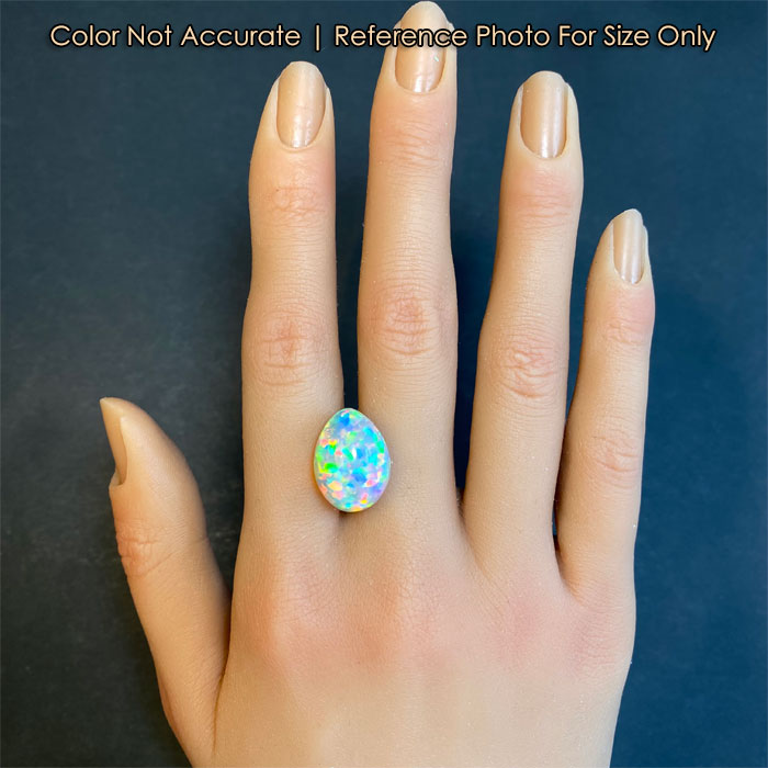 opal gemstone pear shape on hand