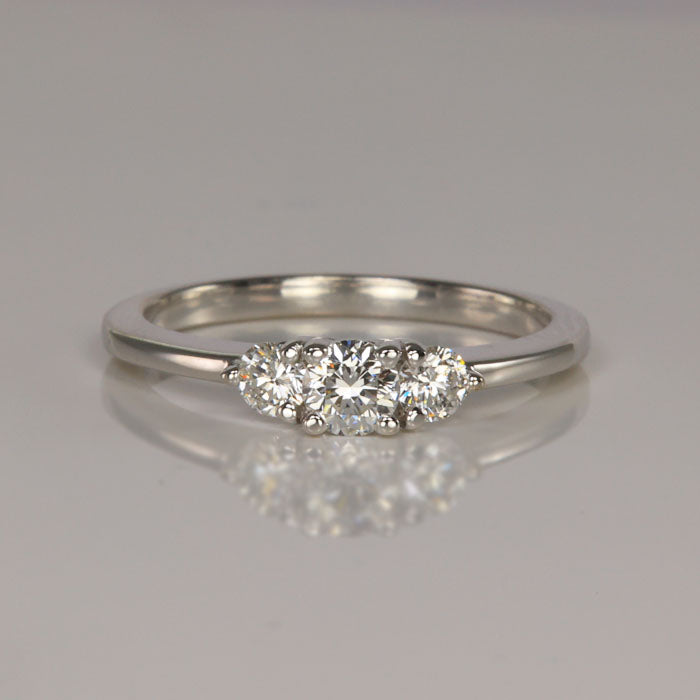 three stone diamond ring white gold