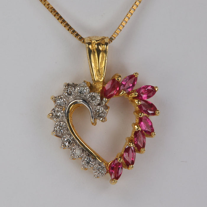 marquise cut rubies and diamond accent heart pendant
