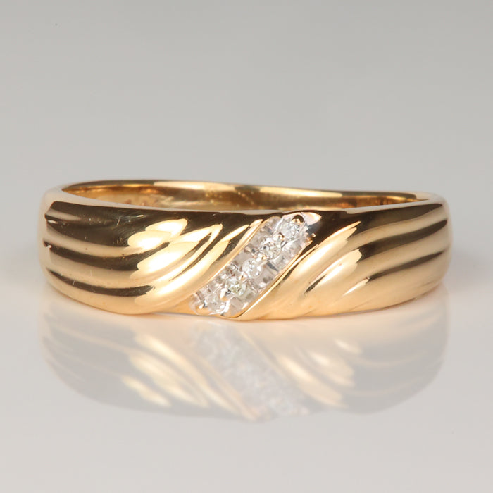 yellow gold diamond accented men's ring with ridges