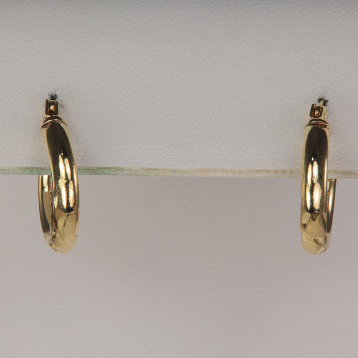 estate hoops in yellow gold with diamond cut design