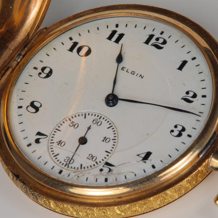 yellow gold elgin pocket watch face