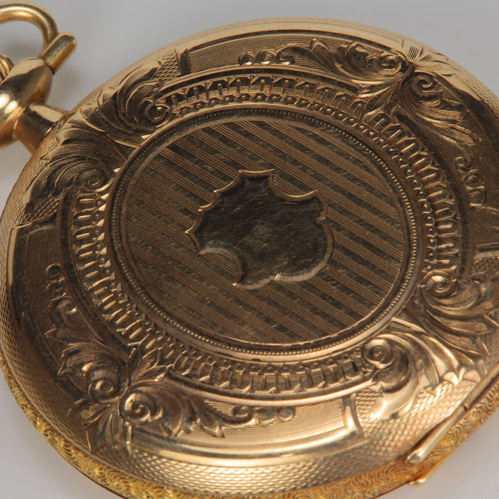 front of yellow gold elgin pocket watch
