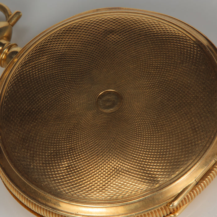 pocket watch back in yellow gold