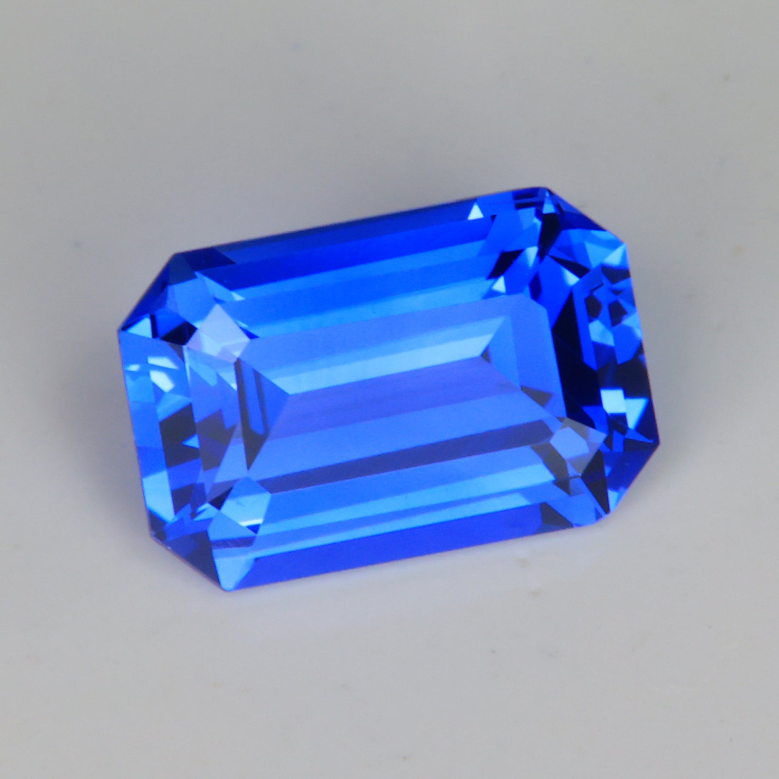 blue color emerald cut sapphire gemstone