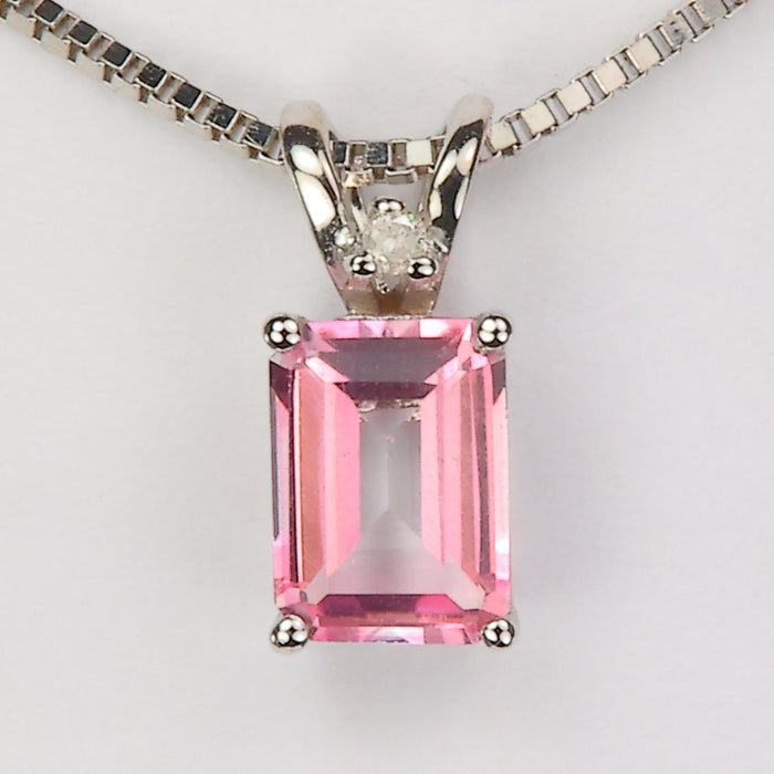 white gold emerald cut synthetic sapphire pendant