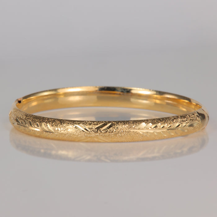 yellow gold estate bracelet with diamond cut detail