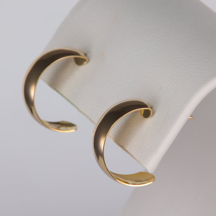 side of yellow gold half hoops