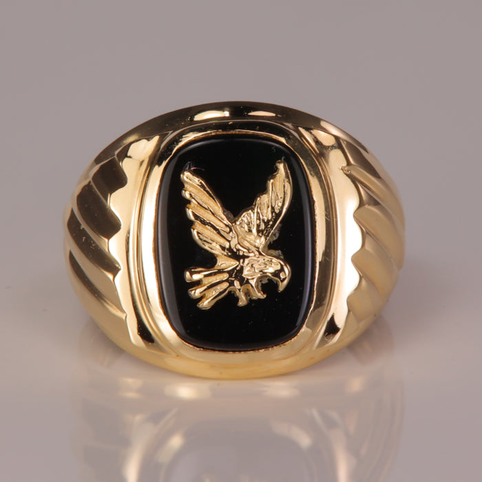 yellow gold estate ring with onyx and eagle